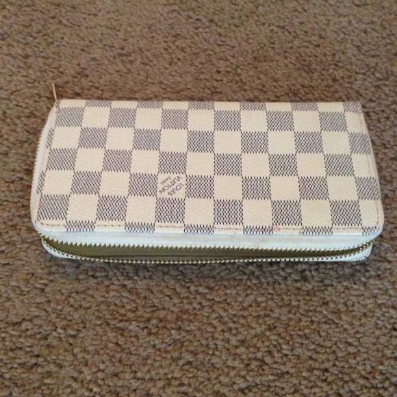 Previously own inspired LV wallet.