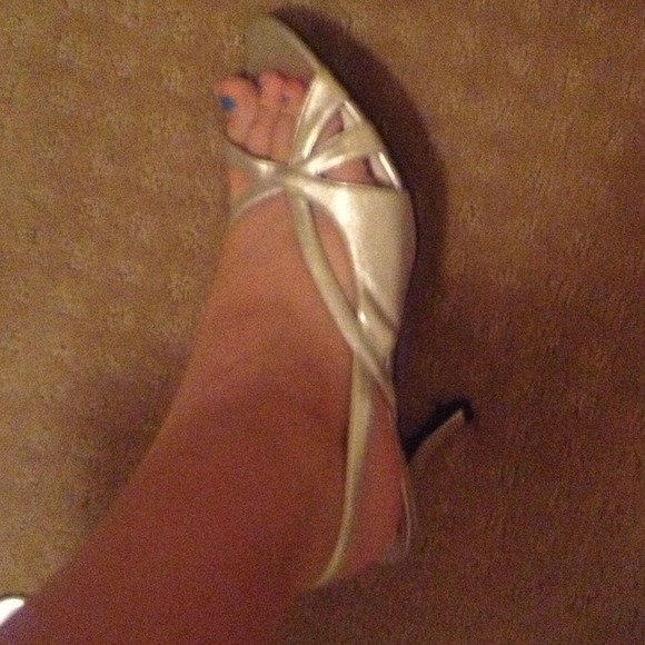 Silver one inch high heels