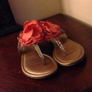 Floral snakeskin sandals.