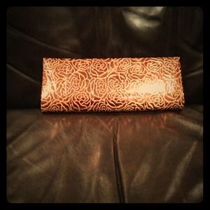 Copper tones clutch bag