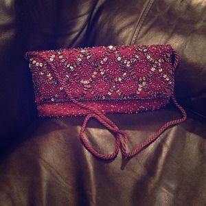 Brown sequined clutch bag