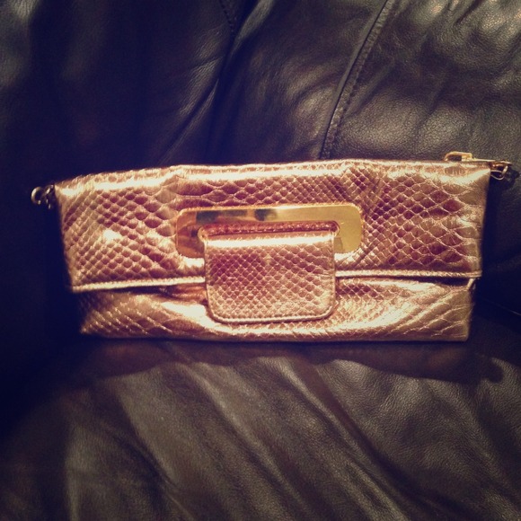 Gold snakeskin look clutch bag