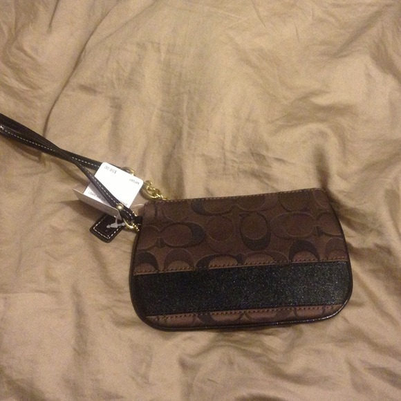 Authentic coach wristlet in mocha/brown