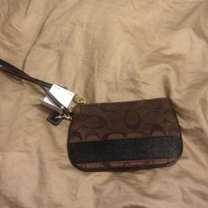 Authentic coach wristlet in mocha/brown