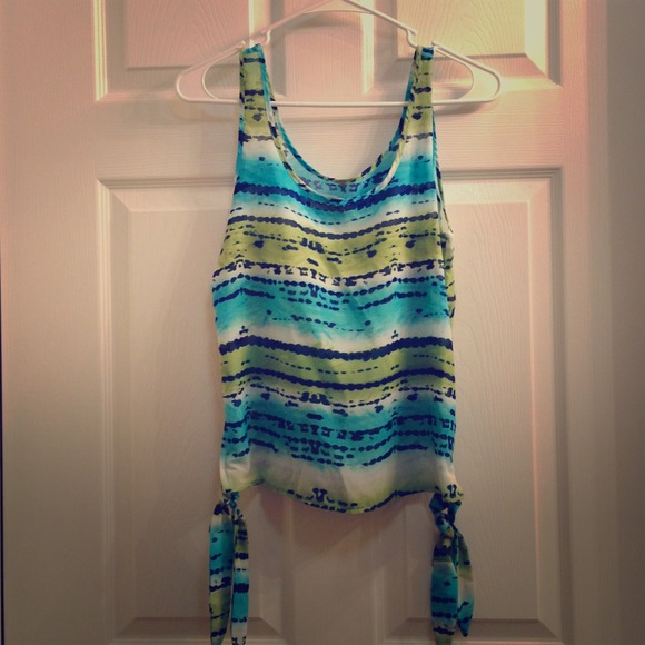 Tops - Tank top with tied up sides.