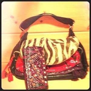 Animal print, black, cream, red, and purple purse