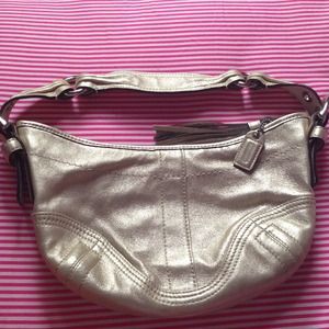 Authentic shimmery gold coach bag