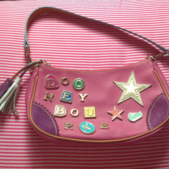 Authentic Dooney & Bourke crescent zip top bag