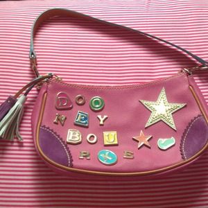 Authentic Dooney & Bourke crescent zip top bag