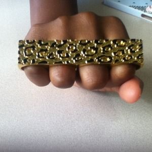 Cheetah print gold brass knuckles