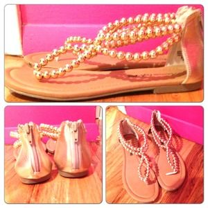 gold American eagle sandals & shirt