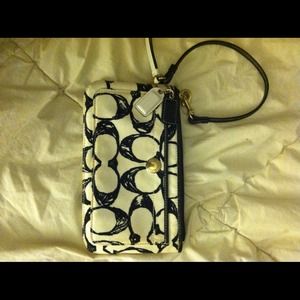 *Reduced price* Black and white coach wristlet