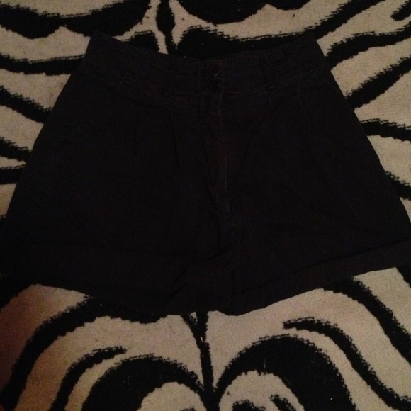High waisted black cuffed shorts.