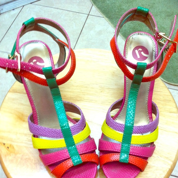 Pair of multi color sandals. Renee a size 7.5