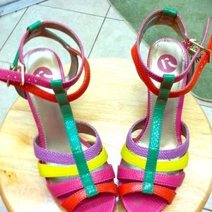Pair of multi color sandals. Renee a size 7.5