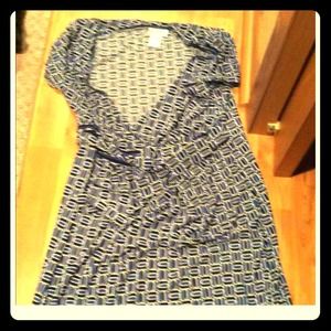 Lot of maternity jeans, pants and dress.