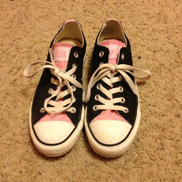Pink and black converse