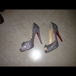100% authentic christian louboutin woman's shoes.