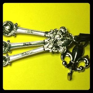 Silver Fleur de lis measuring spoons