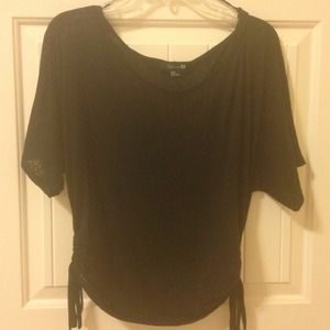 Black sheer knit top with same color animal print.