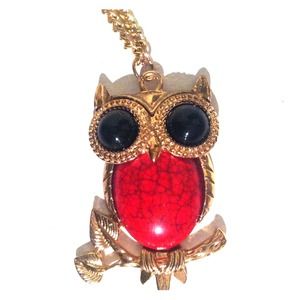 Long chain owl necklace.