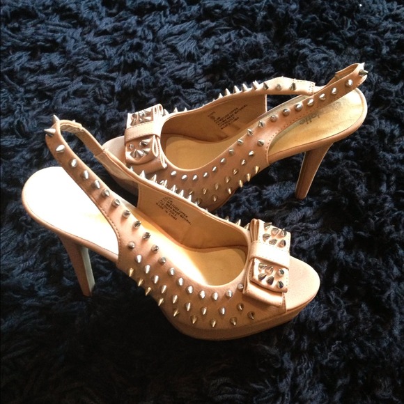 Nude spiked heels