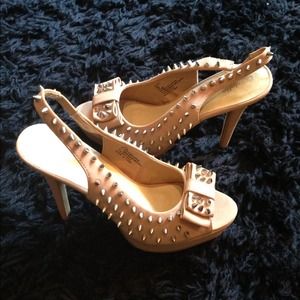 Nude spiked heels