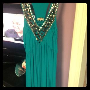 Turquoise tank top with gem neck line'