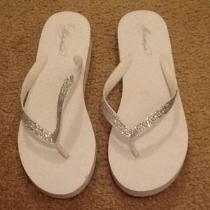 White rhinestone studded flipflps