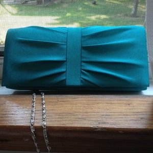 Charming Charlies turquoise clutch