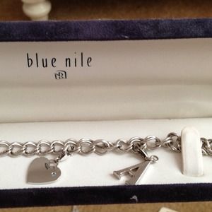 Blue nile silver bracelet with charms