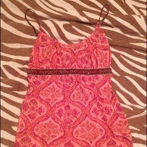 Fun and cute red tank top with designs