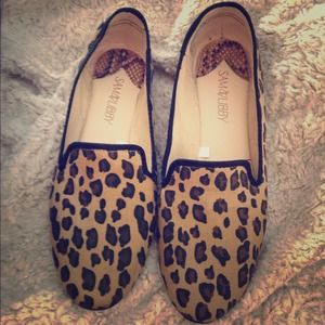 Cheetah print flats on hold