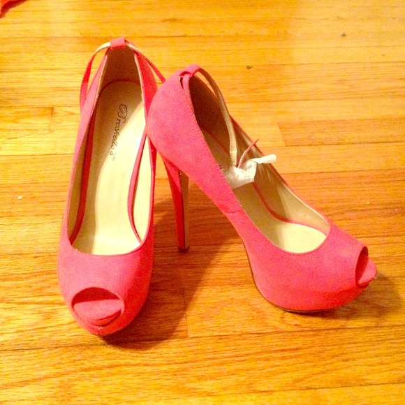 Pink high heels. Never worn