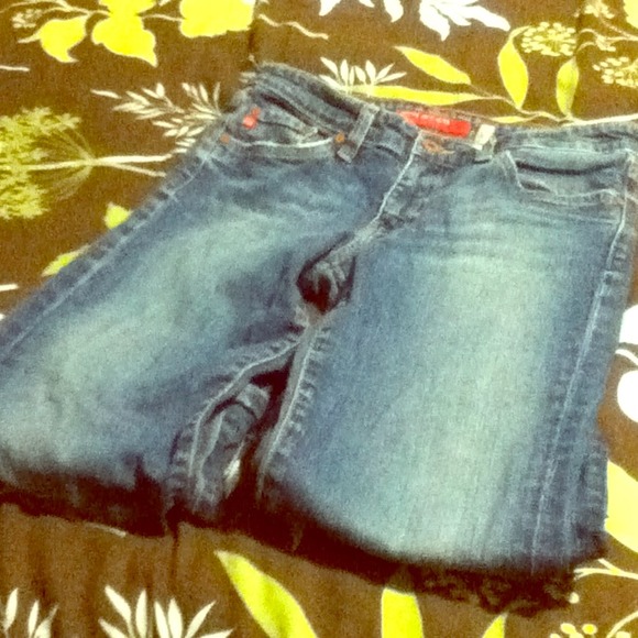 A pair of flare jeans