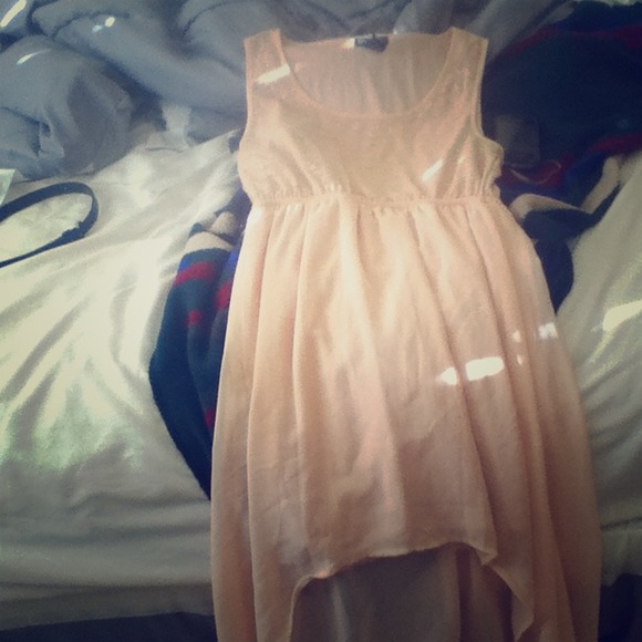 Size M Tan high low never worn.