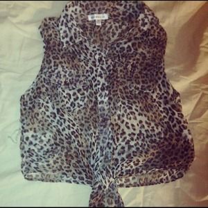 Cheetah print silky top with ties at the bottom 😍