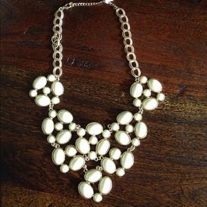 White bib necklace