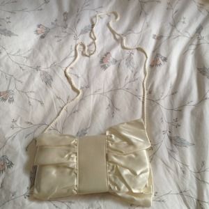 Satin cream clutch