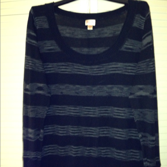 Black and gray sweater.