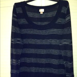 Black and gray sweater.