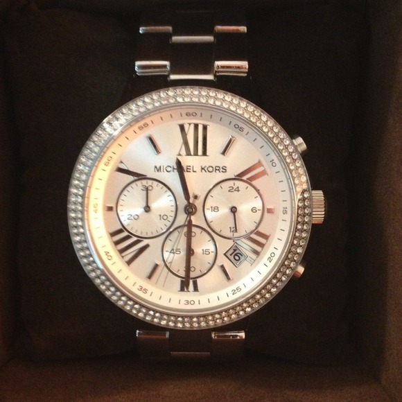 Silver Michael kors watch never worn or sized