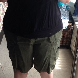 Army green colored cargo shorts