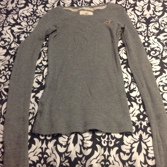 Tight gray long sleeve.