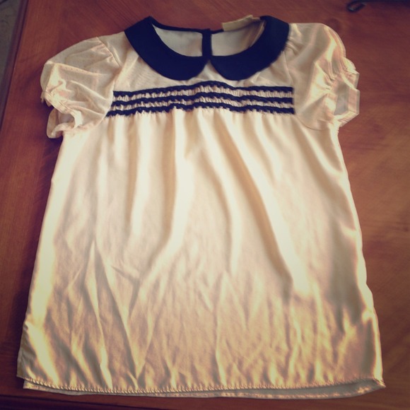 Cream silk and sheer top