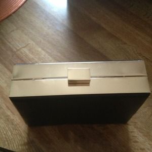 Square black and gold clutch