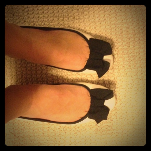 Pearl and black flats!