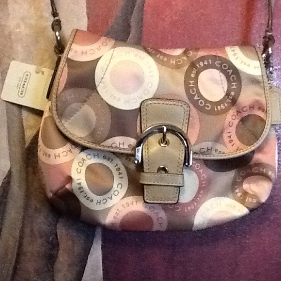 Brand new Coach sleek and stylish purse