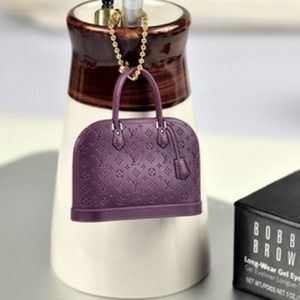 Purple  Lv bag anti dust headphone jack plug