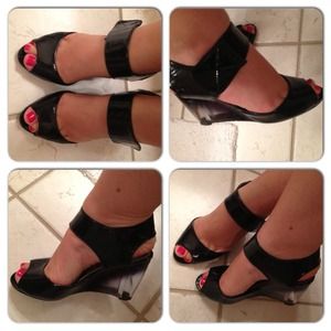 Black soft leather wedges.